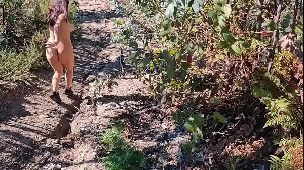 My friend's mother takes her clothes off in the woods during a walk