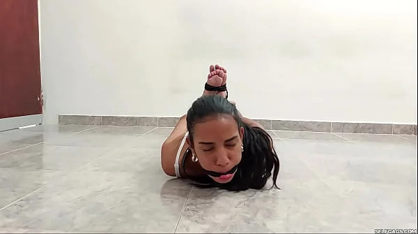 Hogtied Teen Gagged And Struggling In Rope Bondage